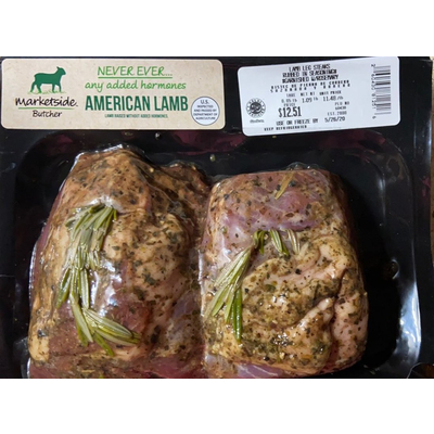 Lamb Leg Steaks Rubbed in Seasonings & Garnished with Rosemary